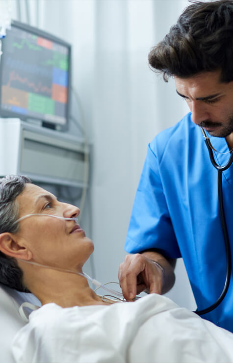 neurosurgeon checking patient after surgery