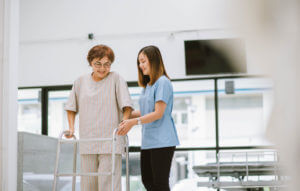 Older woman using a walker