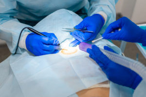 Surgeons Operating Back Surgery for treating spinal disorders