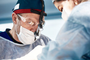 Close-up of neurosurgeons in the operating room during the operation