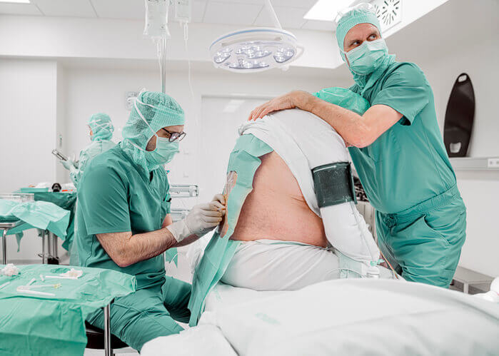 Spine Surgeons Operating Surgery