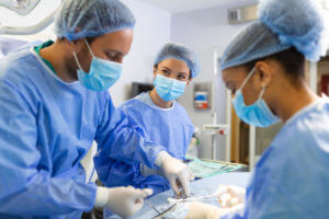 Doctors Opearting Spine Surgery in theater