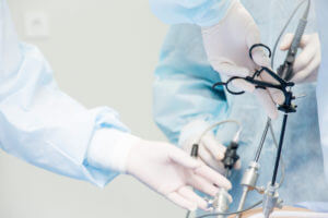 Surgeon performs minimally invasive spine surgery